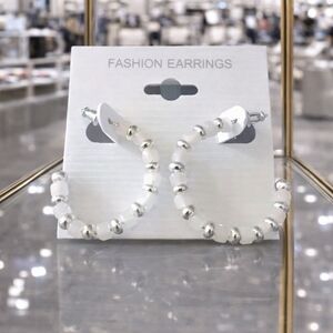 Silver and white beaded hoop earrings